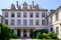 French tricolor and banner flag on mairie text building mean city hall in town center of La Roche-sur-Yon vendee in France