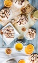 French vanilla meringue with chocolate and caramel, orange tea Royalty Free Stock Photo