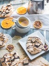 French vanilla meringue with chocolate and caramel, orange tea Royalty Free Stock Photo