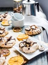 French vanilla meringue with chocolate and caramel, orange tea Royalty Free Stock Photo