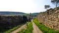 The french Way of `Camino de Santiago` in Winter. Pilgrimages on their journey through Spain Royalty Free Stock Photo