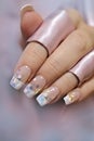 French wedding manicure with translucent glitters, white dots