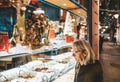 French woman admiring diverse sweets chocolates