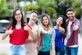 French young adult woman with group of friends in line Royalty Free Stock Photo