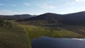 Frenchman Lake reservoir in California west shore surrounded by mountains hills and trees drone high POV photo Royalty Free Stock Photo