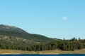 Frenchman lake at sunset land and water with full moon in the sky