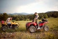Frends riding on  quad bike.quad bikes on the mountains Royalty Free Stock Photo