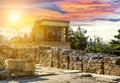 Fresco with bull and three columns in Palace Knossos under sunset, Crete island, Greece