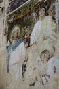 Old fresco depicting Jesus Christ and Pontius Pilate on wall of destroyed Christian Orthodox Church of Nicholas Wonderworker.
