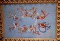 Fresco with eight winged puppets that seem to dance in the Vatican museums in Rome (Italy) Royalty Free Stock Photo