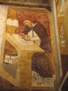 Fresco image of a Medieval monk with spectacles, earliest recorded image of eye glasses