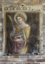 Fresco of Saint Agnes, Virgin and Christian Martyr, in the Church of the Martyrium, Basilica of Saint Stephen in Bologna, Italy.