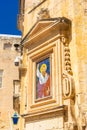 Fresco of a saint in the street of Mdina, Malta