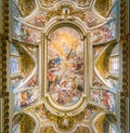 Fresco with the `Triumph of the Order of Saint Francis` by Giovan Battista Gaulli, in Basilica of the Santi XII Apostoli, in Rome. Royalty Free Stock Photo