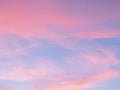 Soft, fluffy and colorful cloud formation. Abstract idyllic pink and blue sky. Blur background texture of colorful sunset clouds.