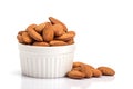 the fresh almonds in white cup on white background Royalty Free Stock Photo