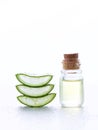 Fresh aloe vera with aroma oil on moisture background.