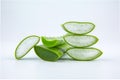 Fresh aloe vera leaves and slices on wooden table. Royalty Free Stock Photo