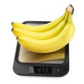 Fresh appetizing bananas. fruit on kitchen scales on wh Royalty Free Stock Photo