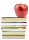 Fresh apple on pile of books Royalty Free Stock Photo
