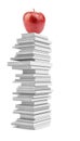 Fresh apple on pile of white books Royalty Free Stock Photo