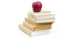 Fresh apple on stack of old books Royalty Free Stock Photo