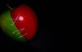 apples on black backgroundgreen and red Apple on a black background Wallpapers, healthy food Royalty Free Stock Photo