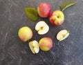 Fresh apples on a concrete background, autumn vitamin