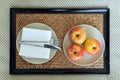 Fresh apples on laid table