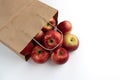 fresh apples in paper bag isolated on white background Royalty Free Stock Photo