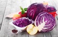 Fresh Apples and Red Cabbage on Wooden table