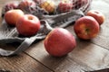 Fresh apples in a stretch bag on a table