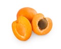 Fresh apricot halves isolated on white background