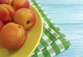 Fresh apricot organic on blue wooden background refreshment, vegan