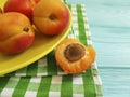 Fresh apricot organic dessert on blue wooden background refreshment, vegan