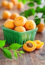 Fresh apricots in bowl on table Royalty Free Stock Photo