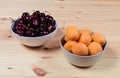 Fresh apricots and cherries berries. Selective focus Royalty Free Stock Photo