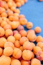 fresh apricots on a tray on a bazaar counter Royalty Free Stock Photo
