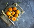 Fresh apricots on a vintage platter.