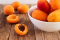 Fresh apricots in a white bowl