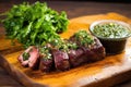 fresh argentinian asado with a side of chimichurri