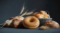 Fresh Artisan Breads and Bagel with Wheat on Dark Background Royalty Free Stock Photo