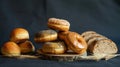 Fresh Artisan Breads and Bagel with Wheat on Dark Background Royalty Free Stock Photo