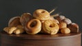 Fresh Artisan Breads and Bagel with Wheat on Dark Background Royalty Free Stock Photo