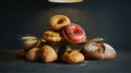 Fresh Artisan Breads and Bagel with Wheat on Dark Background Royalty Free Stock Photo