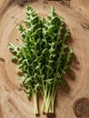 Fresh arugula leaves on wooden background. Top view.