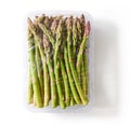Fresh asparagus packaged and sealed; isolated on white, from above