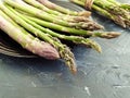 fresh asparagus plate nutrition on a dark concrete background Royalty Free Stock Photo