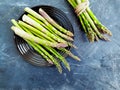 Fresh asparagus plate nutrition season on a dark concrete background Royalty Free Stock Photo