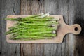 Fresh Asparagus on Rustic Wood Cutting Board Royalty Free Stock Photo